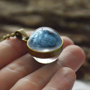 Collier Uranus en boule de verre