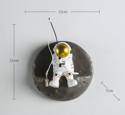 figurine decorative murale astronaute peche etoiles