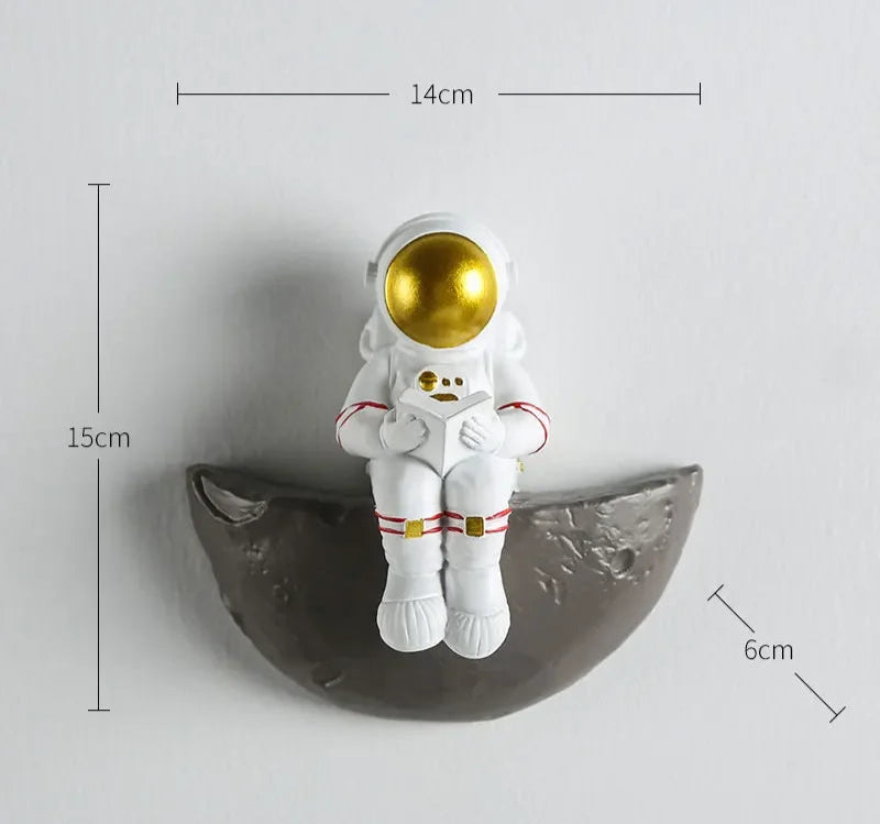 figurine decorative murale astronaute qui lit