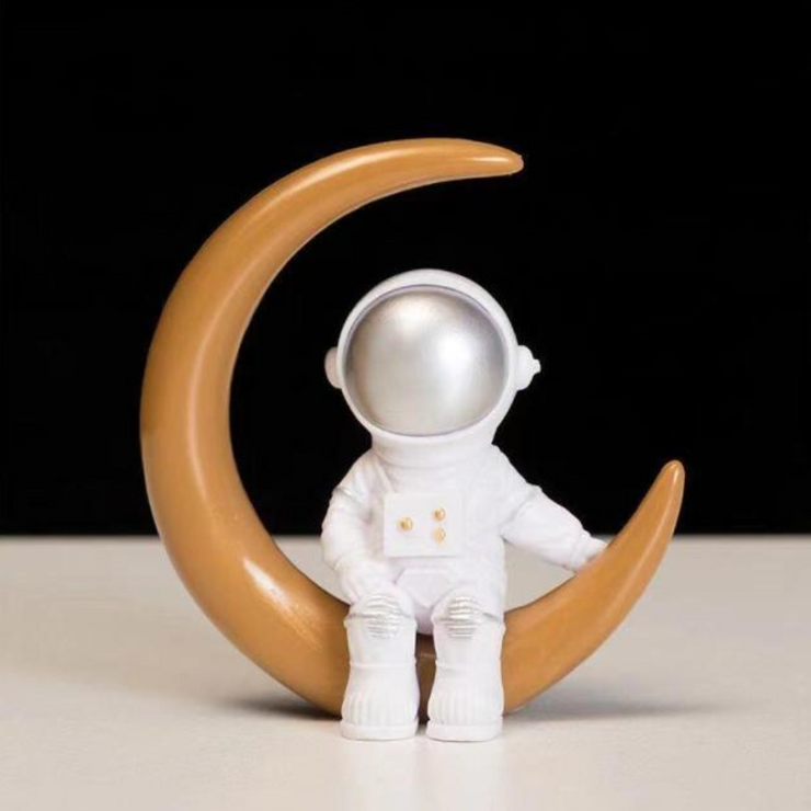 Figurine Astronaute sur un Croissant de Lune