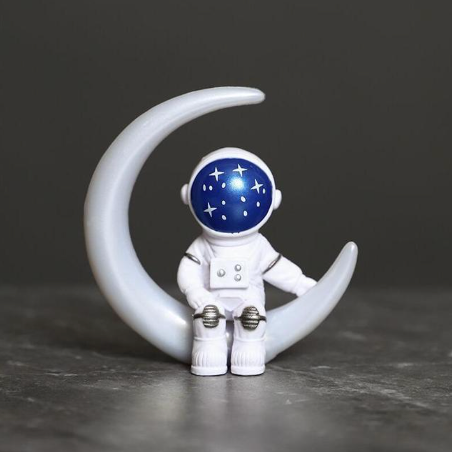 Figurine Astronaute sur un Croissant de Lune