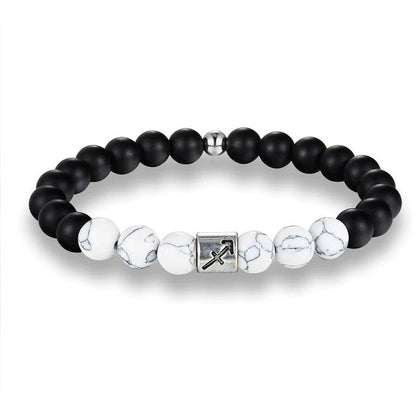 Bracelet Signes du Zodiaque en pierres noires et blanches - Espace Stellaire
